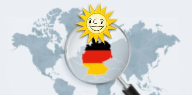 Eine verschwommene Deutschlandkarte mit der Merkur Sonne im Vordergrund.
